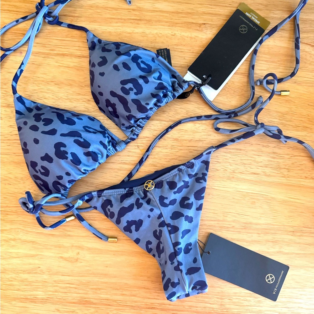 Never worn. New with tags. Super cute blue cheetah Vix paulahermanny.